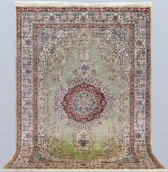 A semi-antique silk Kaysari rug, Turkey, 152 x 103 cm.
