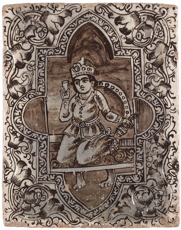 A Qajar moulded figural pottery tile, ca 45 x 35 cm.