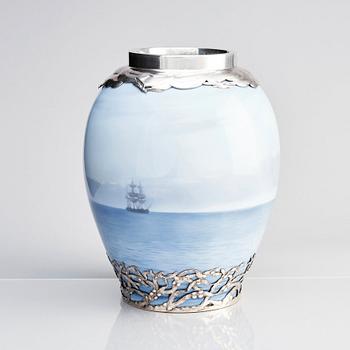 Anton Michelsen, & Royal Copenhagen, a porcelain vase, model 1634, base and mouth of sterling silver, Copenhagen 1914.