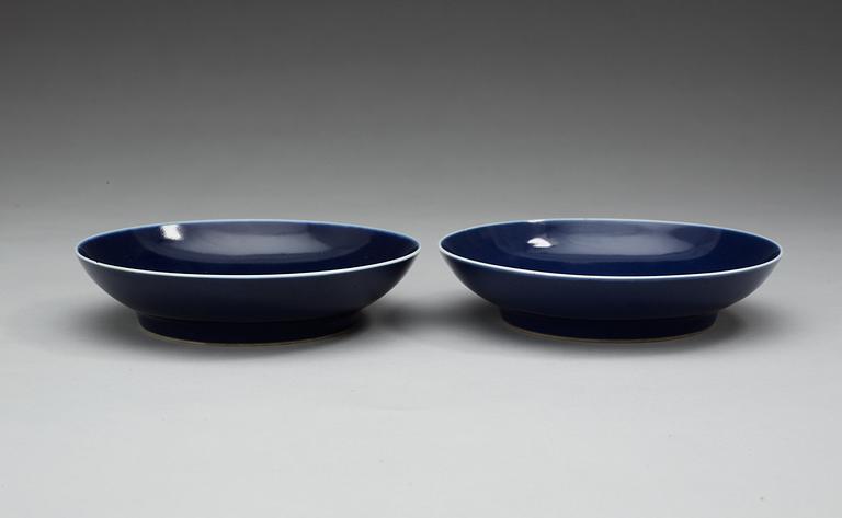 A pair of blue glazed dishes, Qing dynasty, with Qianlongs seal mark.