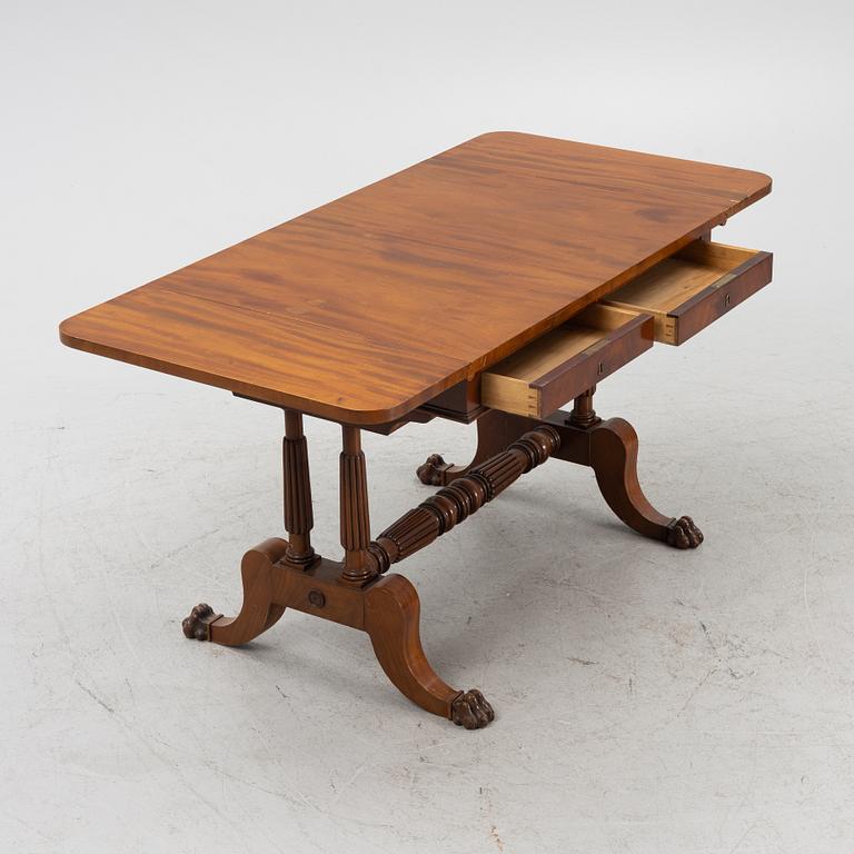 A Swedish Empire twin flap-top mahogany table, first part 19th Century.