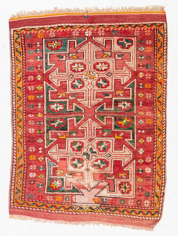 A semi-antique Anatolian rug, c 119 x 87 cm.