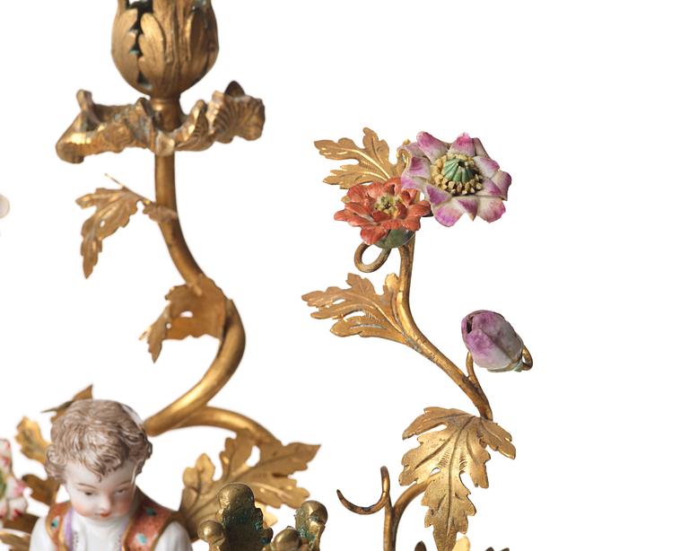 A pair of Meissen Rococo-style three-light candelabra, second half of the 1800's.