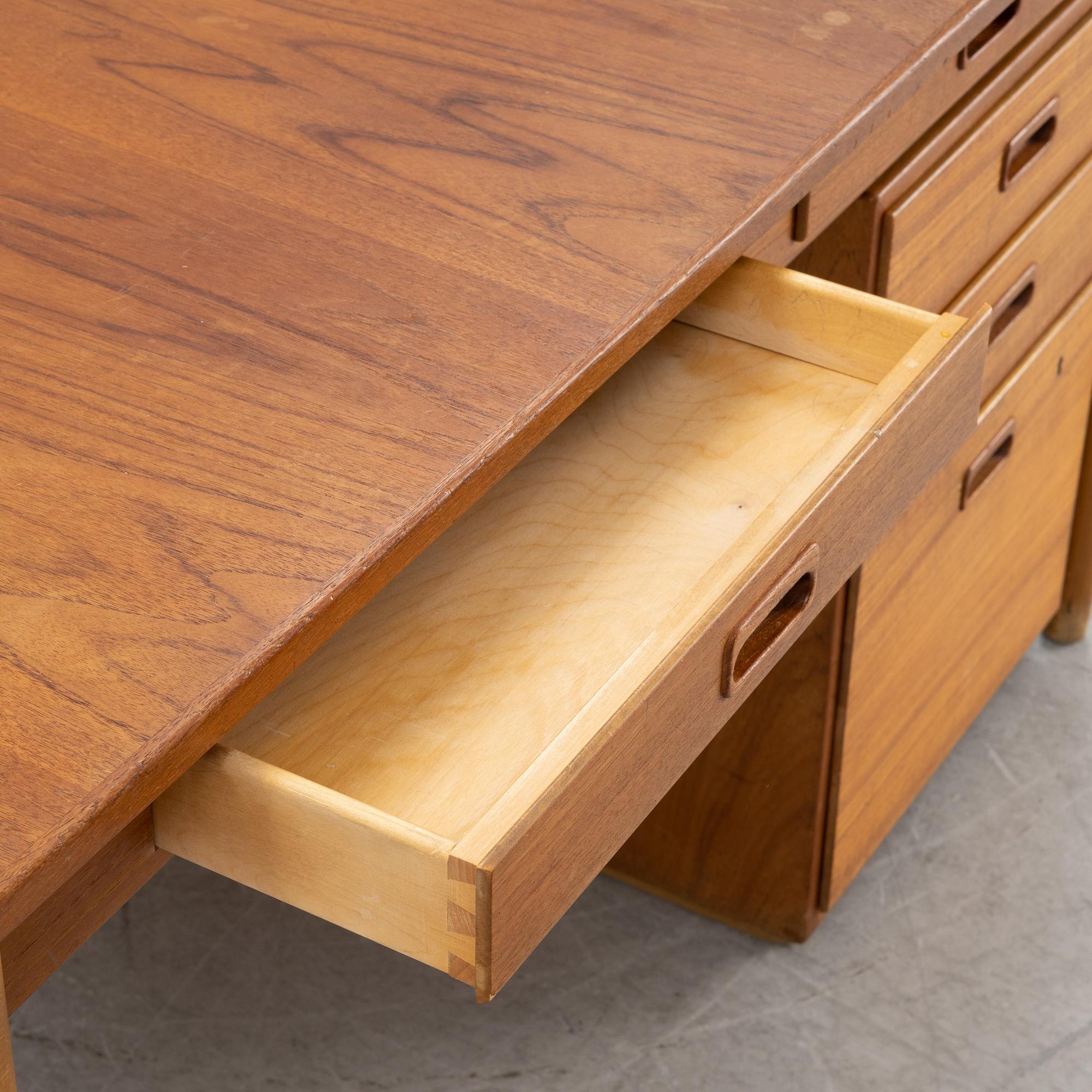 A desk with a drawer unit, Bra Bohag, Hugo Troeds, Bjärnu, mid 20th Century.