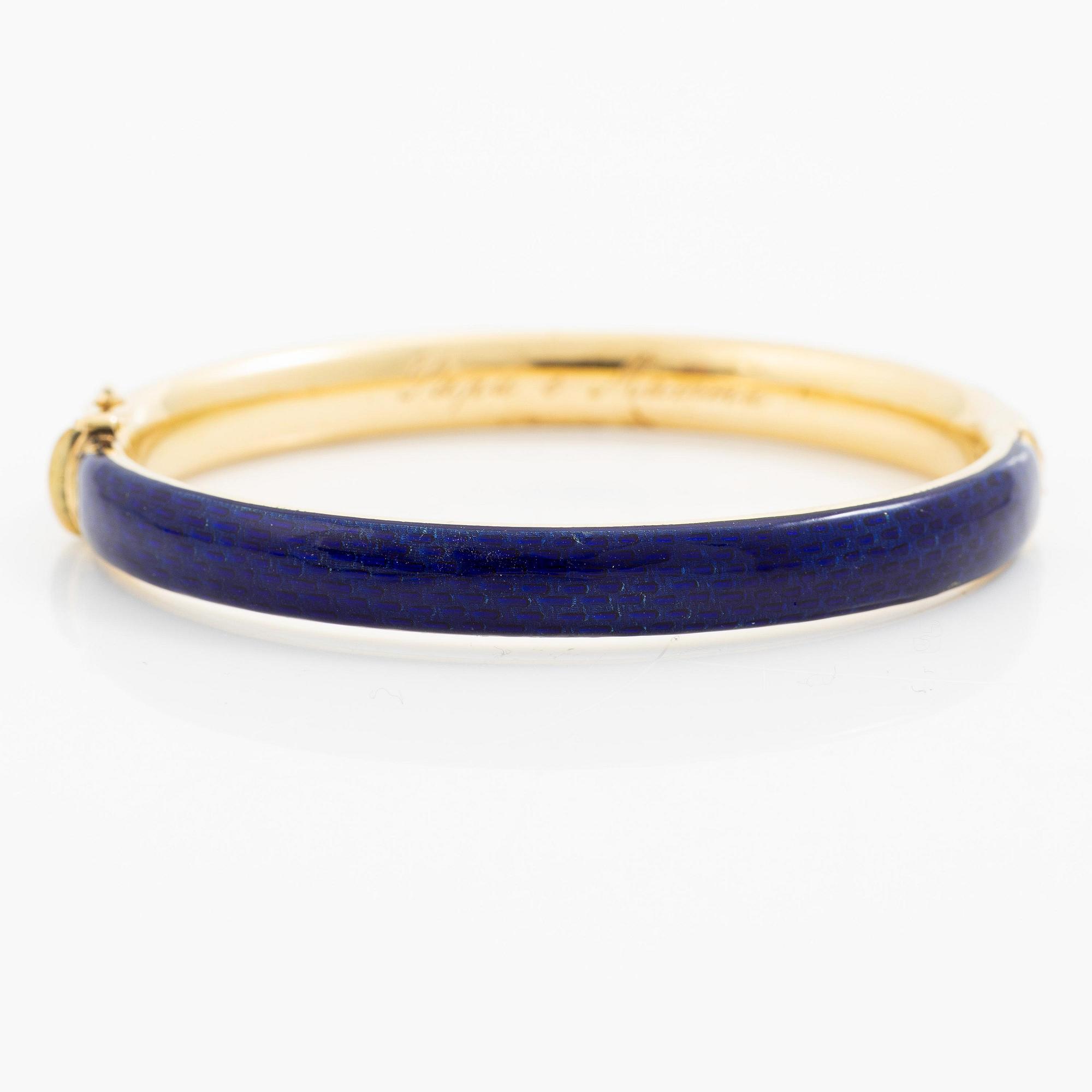 A bracelet 18K gold and enamel.