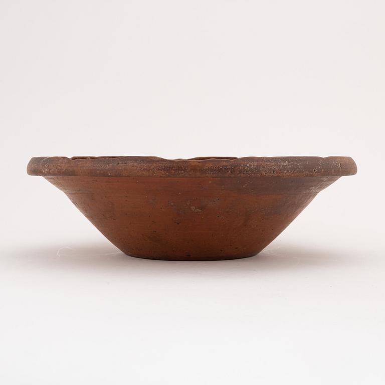 Two clay Swedish folk art dishes, 19th Century.