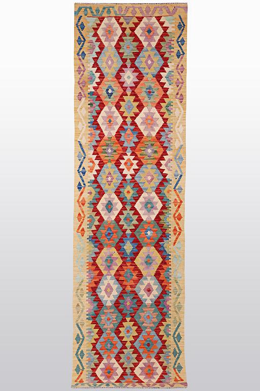 A runner, kilim, ca 314 x 80 cm.