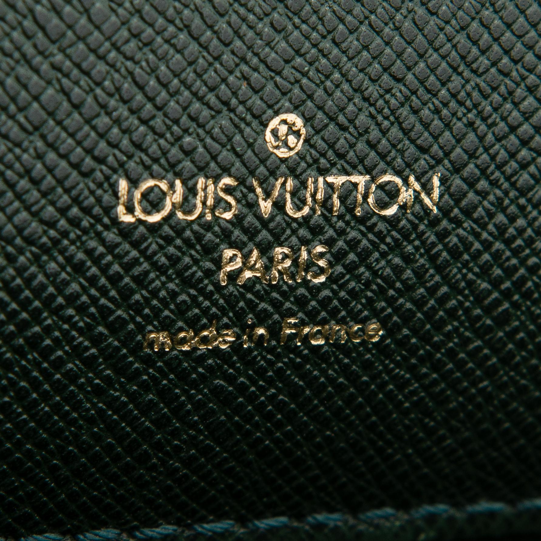 Louis Vuitton, A Taiga leather 'Minuto' Briefcase.