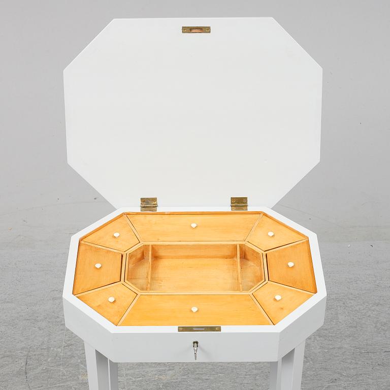 A ladys working table 20 th century.