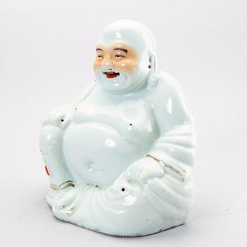 A Chinese 20th century porcelain figurine.