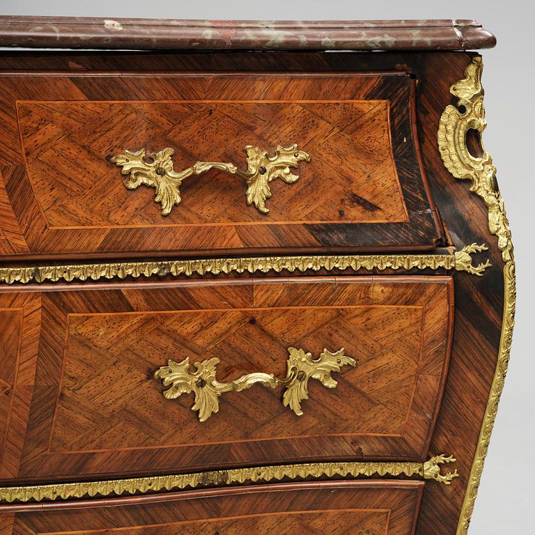 A parquetry and ormolu mounted rococo commode attributed to C. Tietze (master in Stockholm 1764.91).