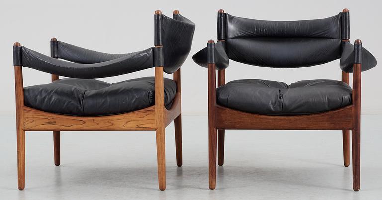 A pair of  Kristian Solmer Vedel palisander and black leather armchair 'Modus' by Søren Willadsen Möblelfabrik, Denmark.