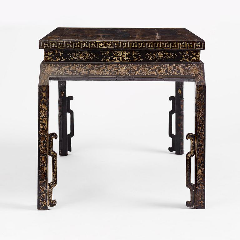 A Chinese painted black lacquer low table, Qing dynasty.