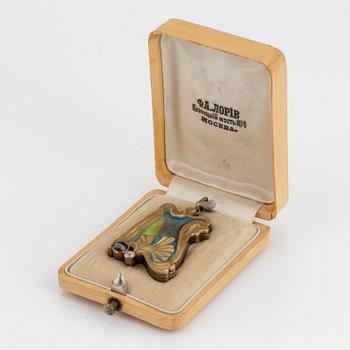 A Fedor Lorie pendant/frame, enamelled 14K gold and silver set with an old-cut diamond and banded agate.