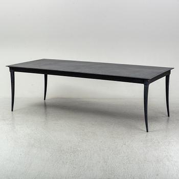 A metal Restoration Hardwood table, 21st Century.