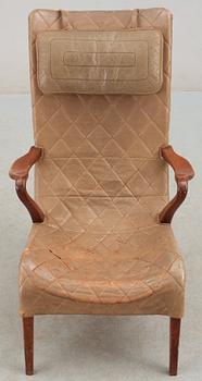 An Axel Larsson birch and leather easy chair, Bodafos, 1940's, model 1207.