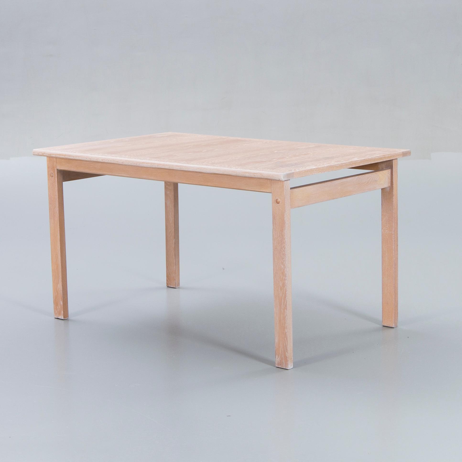 A Danish 1960s dining table and 6 chairs,