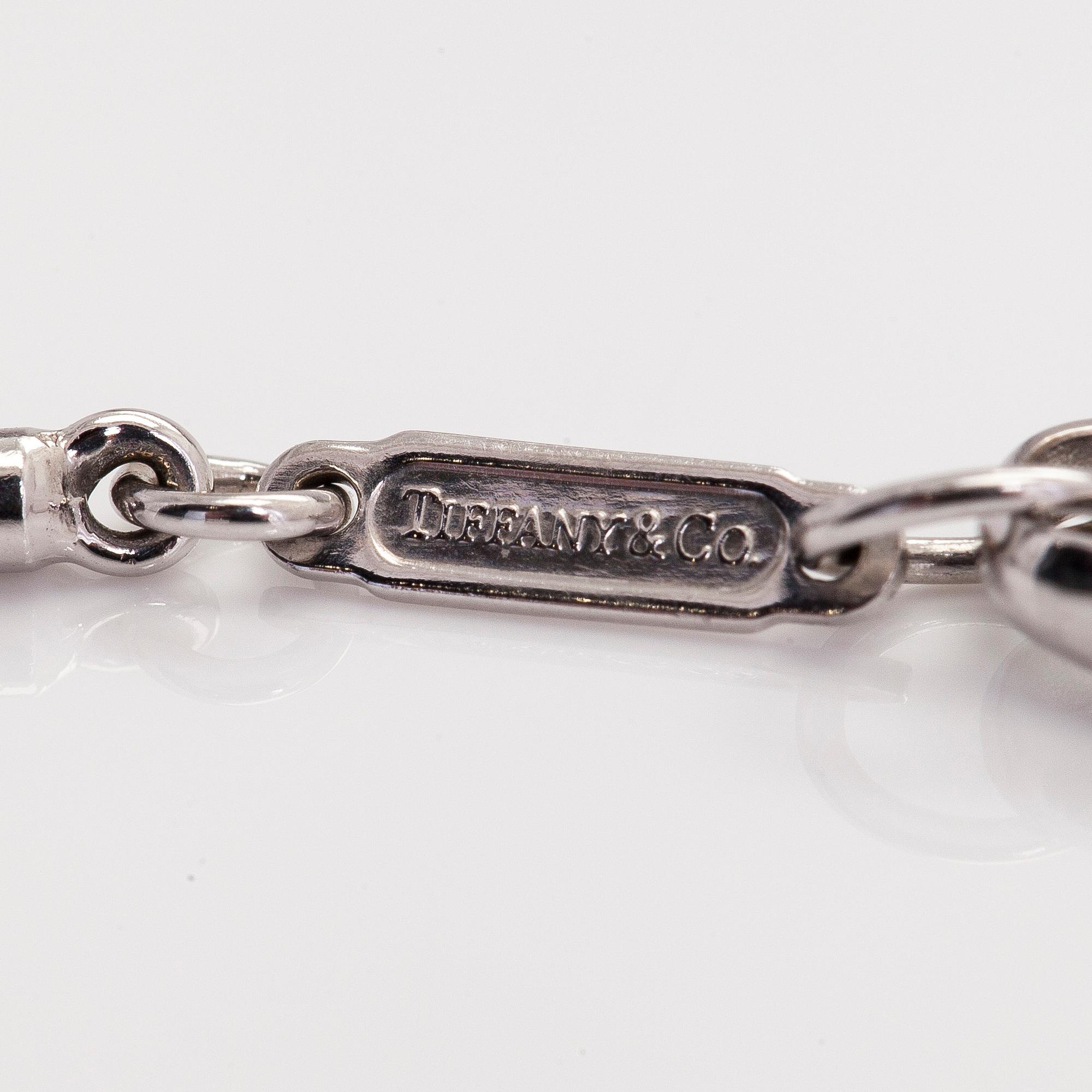 Tiffany & Co, a 18K white gold 'Atlas Bar' necklace with diamonds ca 0.06 ct.
