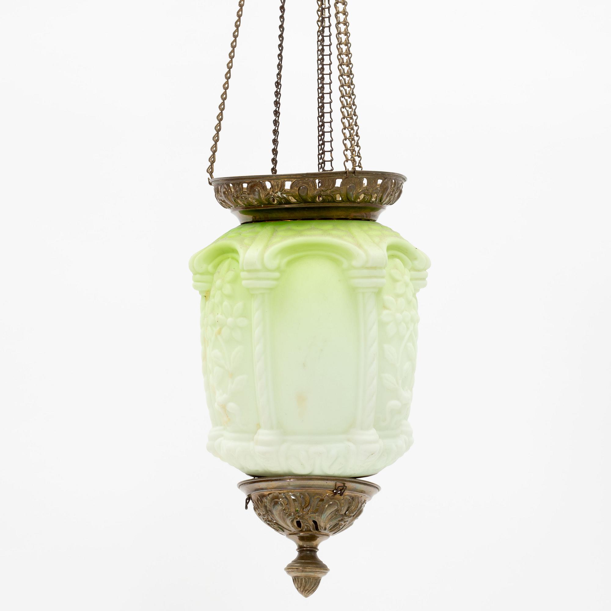 An art noveau glass and brass ceiling lamp from around the year 1900.