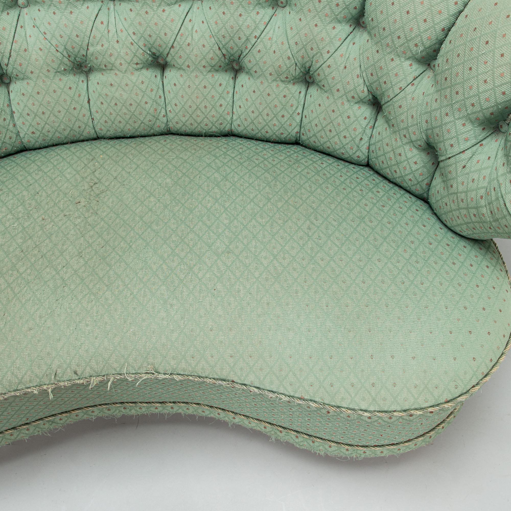 A mid-20th-century sofa.