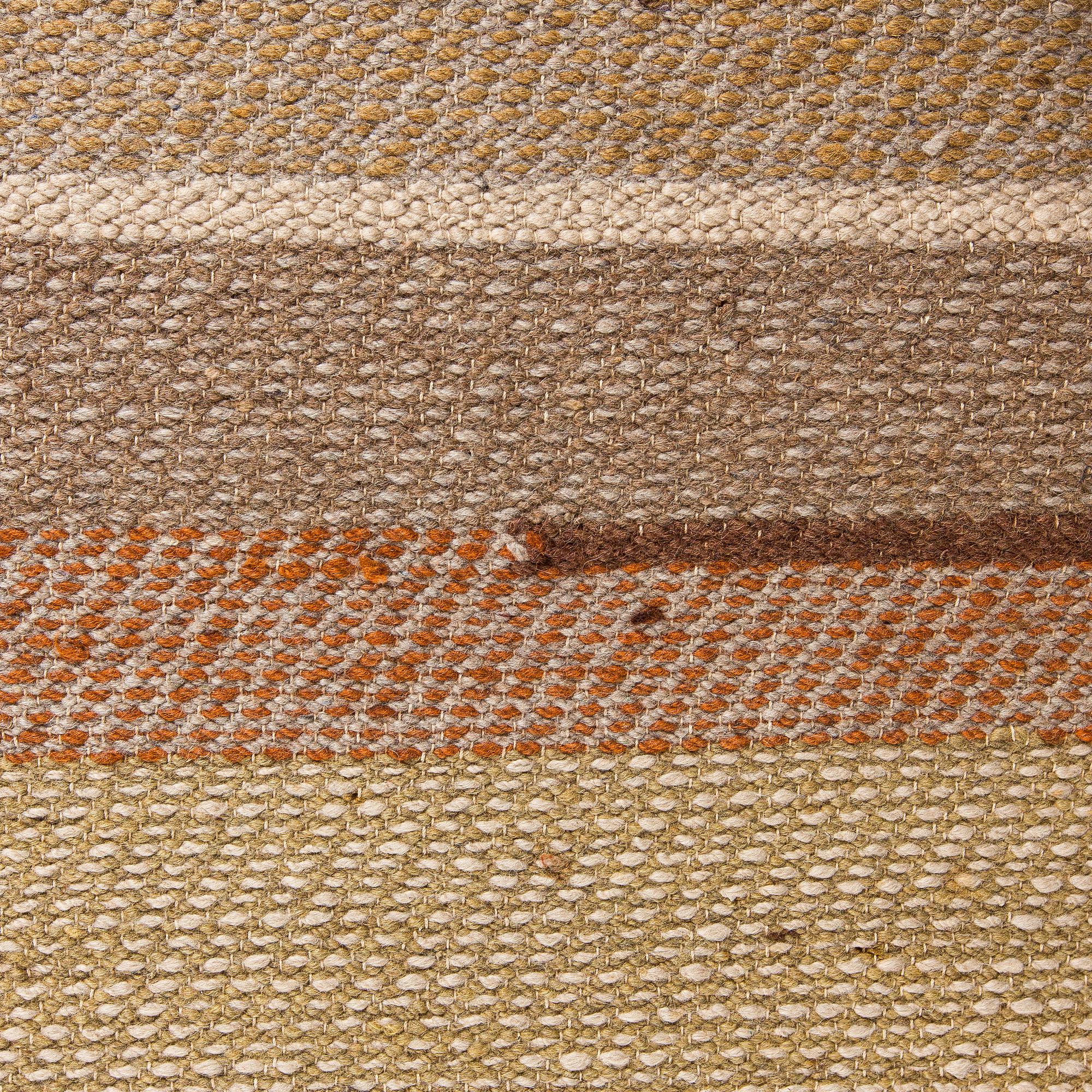 A 1930s finnish flat weave carpet, approximately 430 x 270 cm.