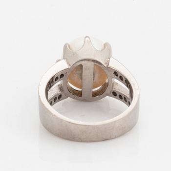 Cultured pearl and brilliant-cut diamond ring.