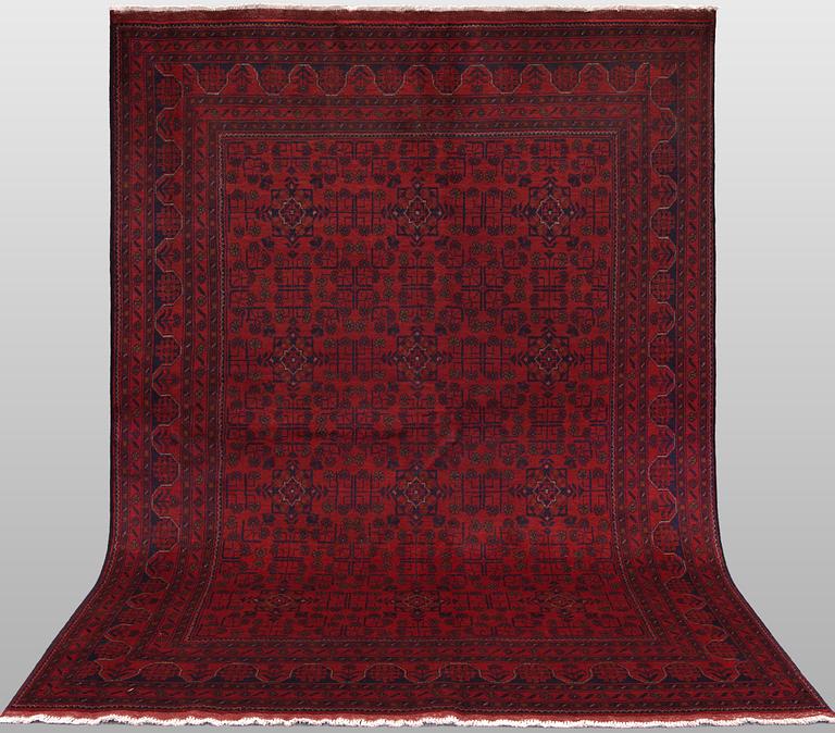 A Afghan carpet, 232 x 167 cm.