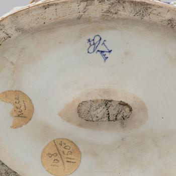 A porcelain figurine, Naples style mark, first half of the 20th century.