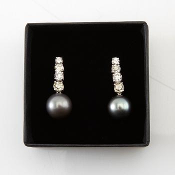 Earrings, a pair of 18K white gold with diamonds and cultured pearls.