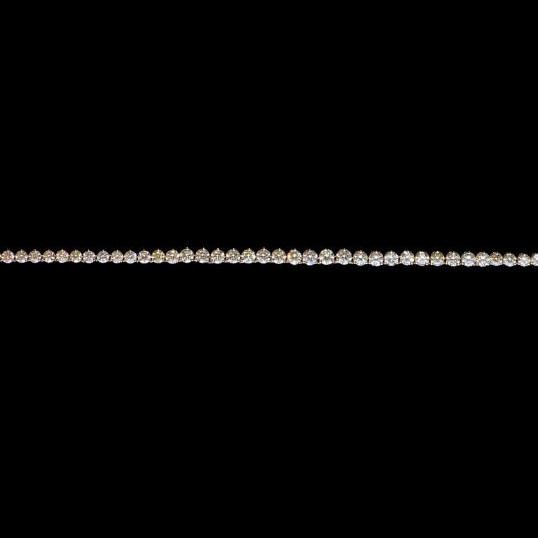 A brilliant cut diamond necklace, tot. 14.70 ct.