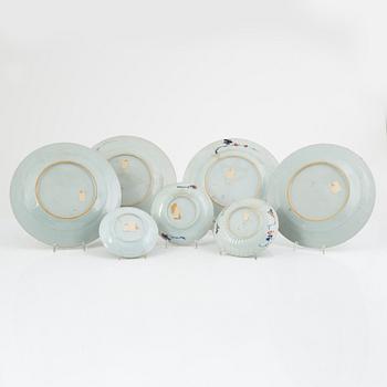 A group of Chinese imari porcelain comprising four plates, three dishes and a cup, Qing dynasty, 18th century.