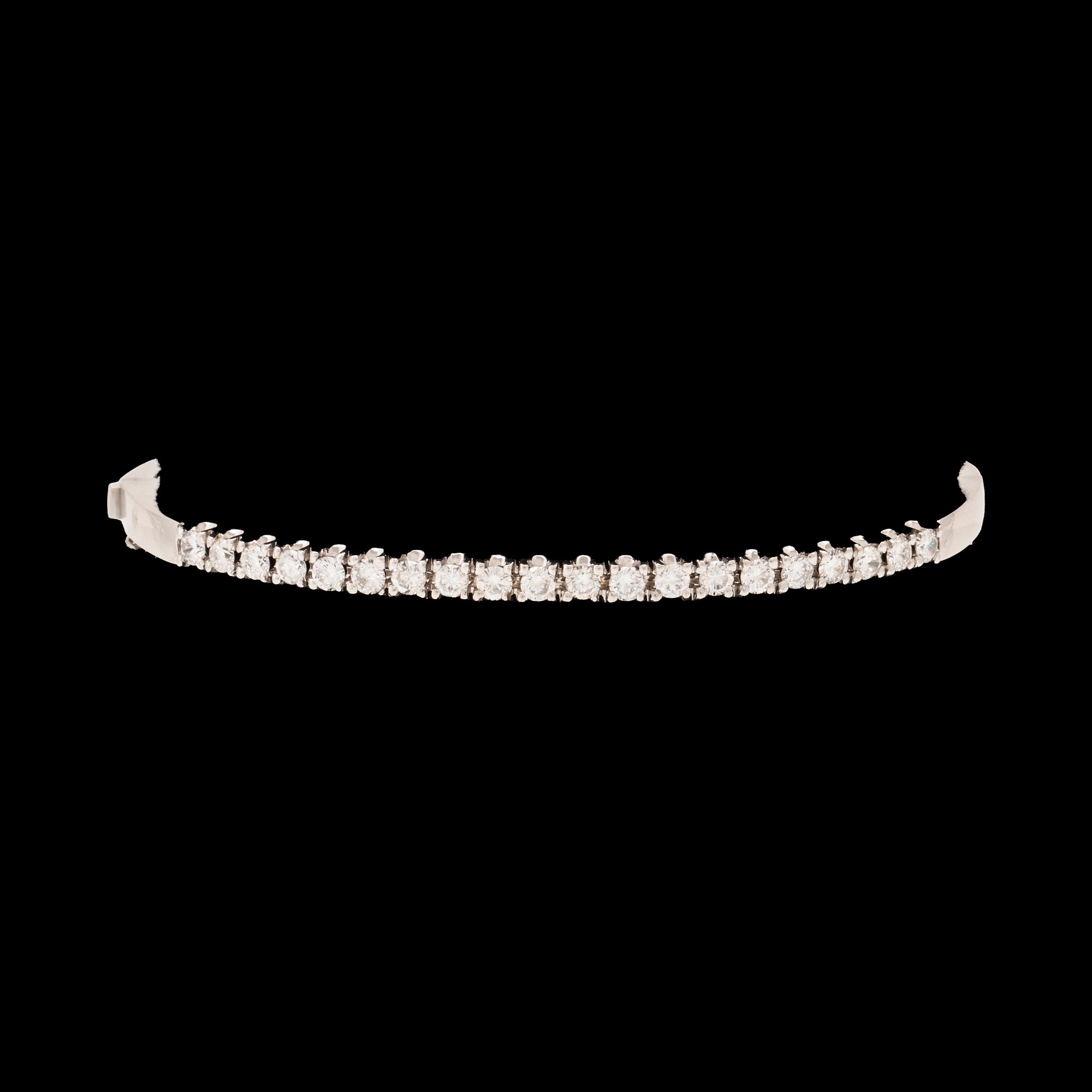An 18K white gold bracelet set with round brilliant-cut diamonds.
