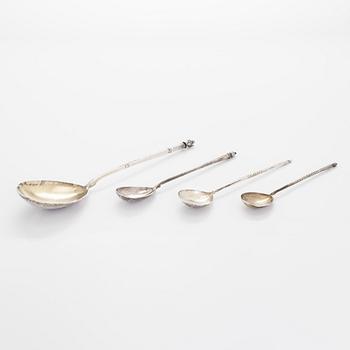 Three silver tea glass holders and four spoons, silver Kostroma and Moscow, late 19th and early 20th centuries.