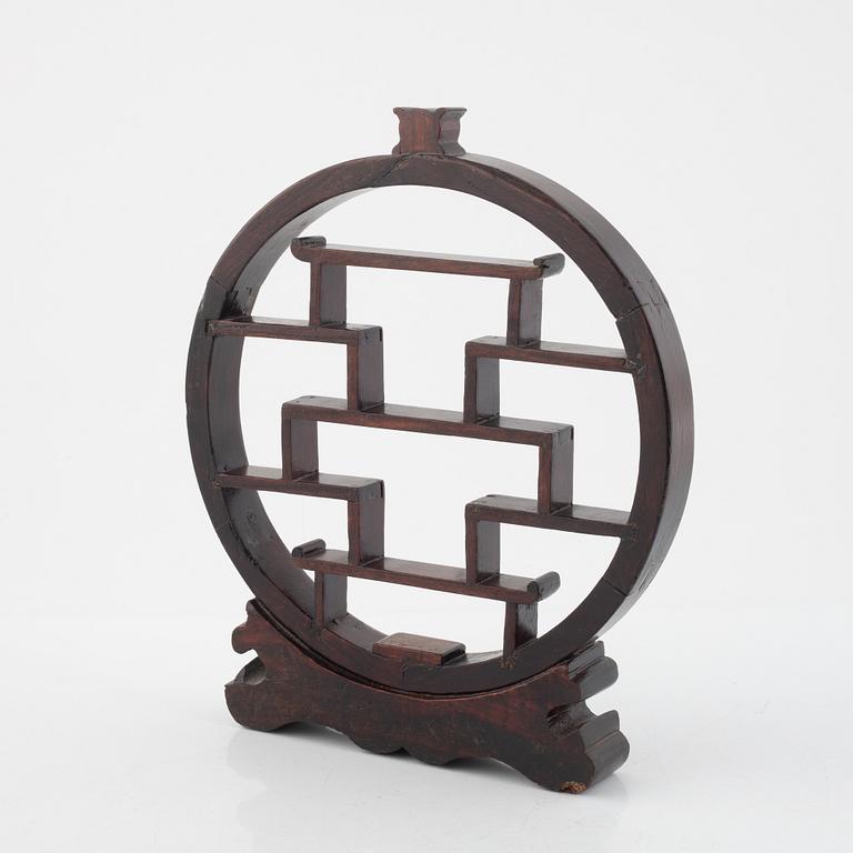 A Chinese wooden stand, 20th century.