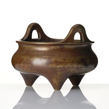 A large bronze tripod censer, Qing dynasty with Xuande six character mark.