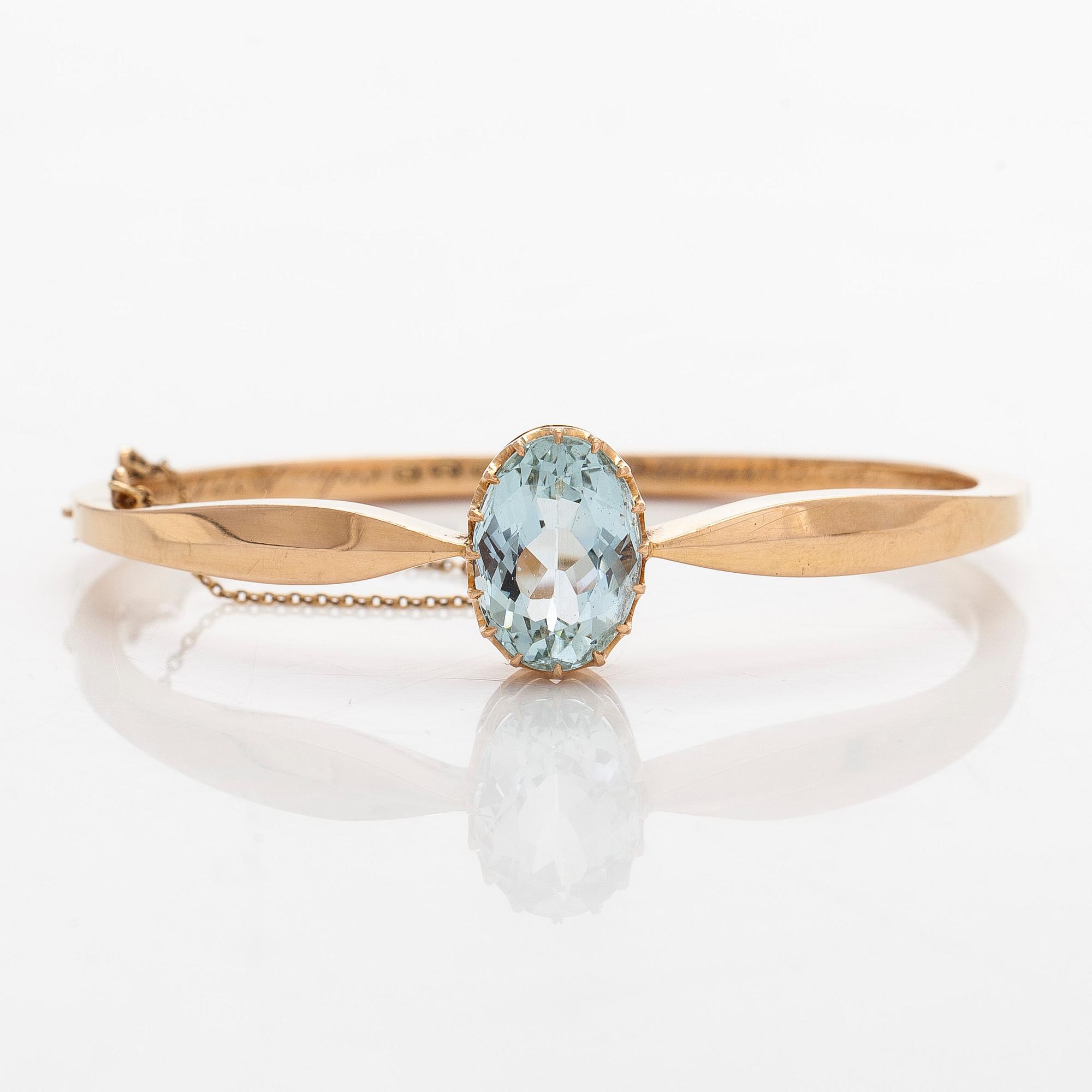 Rannerengas, viistehiottu akvamariini, 18K kultaa, Samuel Mika Westerlund, Porvoo 1927.