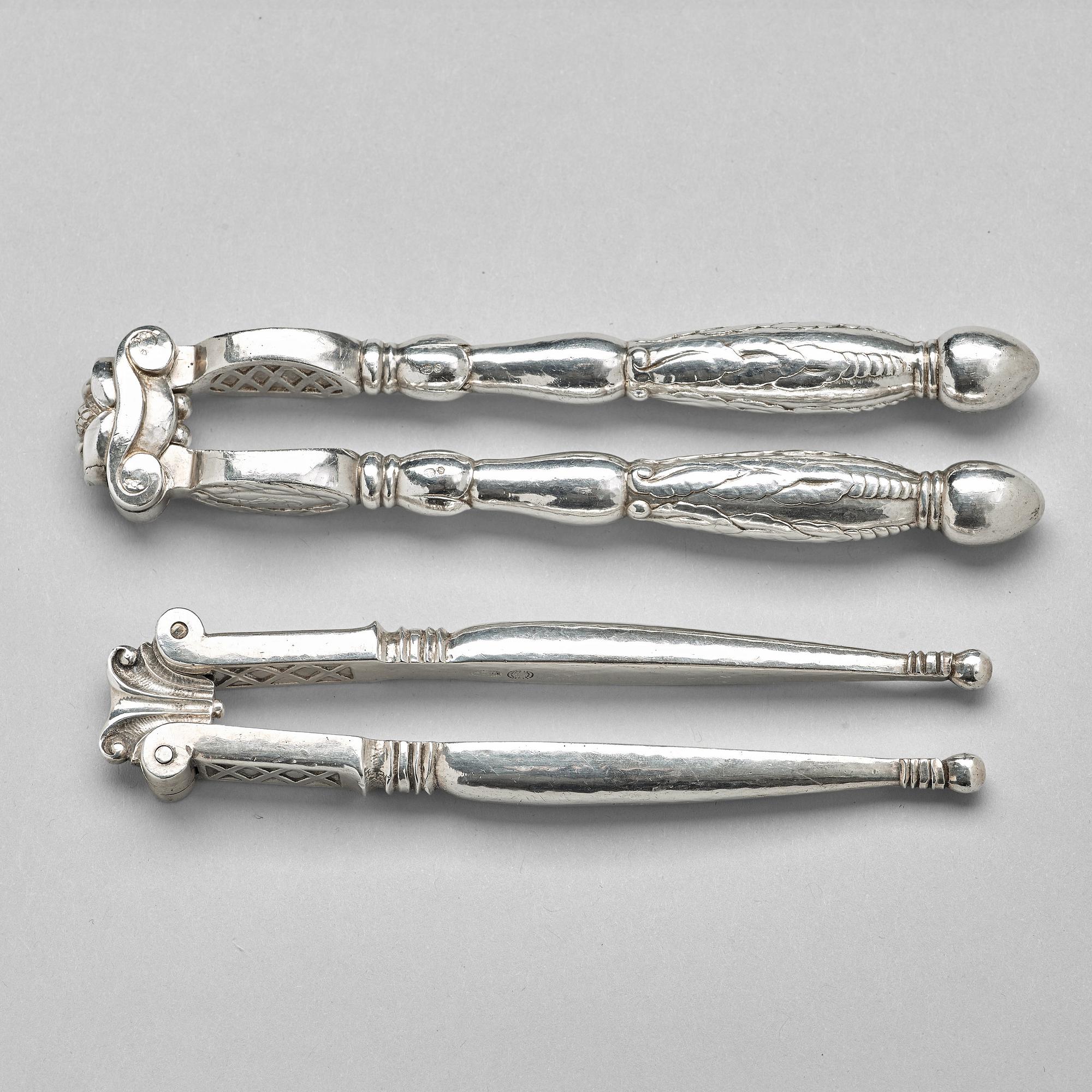 Georg Jensen, OCH JOHAN ROHDE, nötknäppare, 2 st, Firma Georg Jensen, Köpenhamn 1919-27, 830/1000.