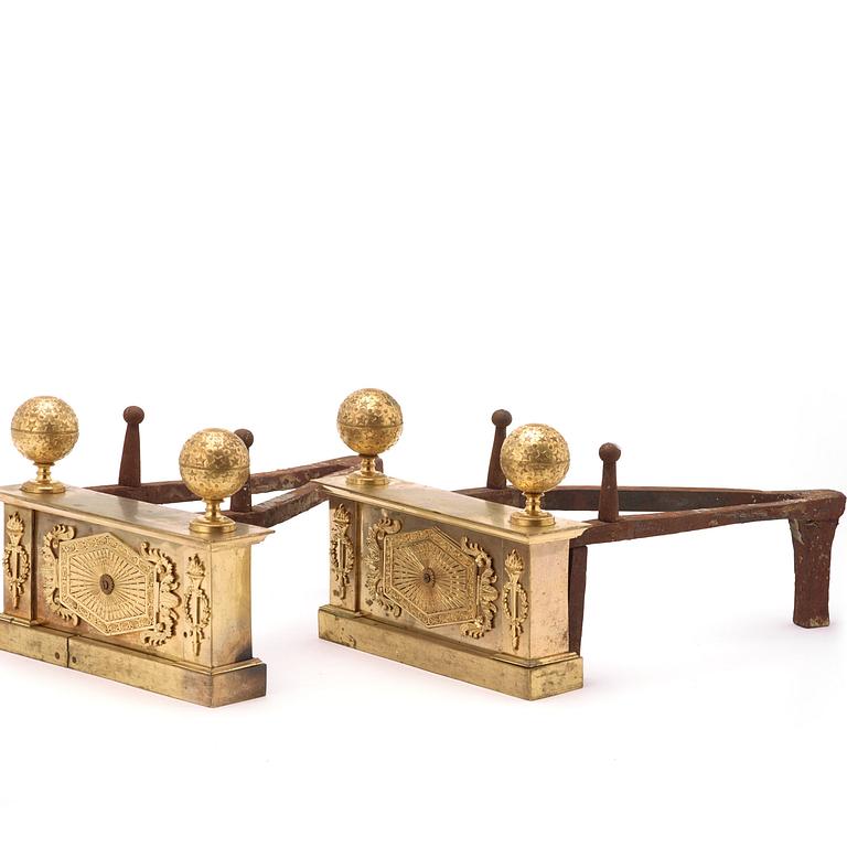 Empire, A pair of French Empire early 19th century gilt bronze chenets.