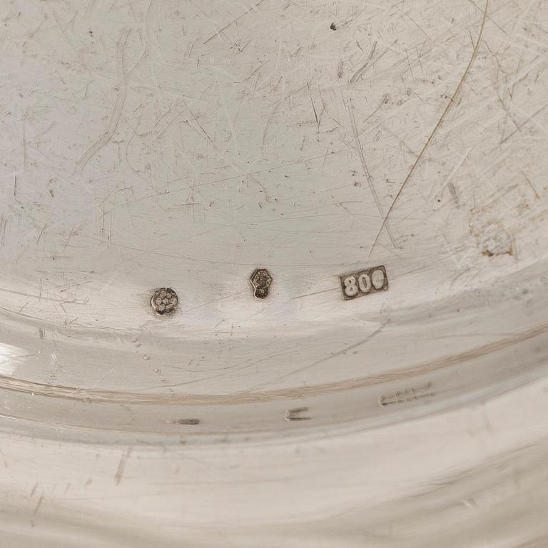 A silver serving platter, and six similar coasters, Austria-Hungary 1867-1922 and Czechoslovakia 1949-1962.