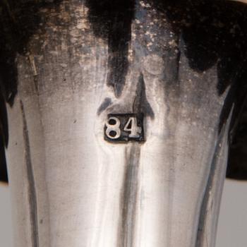 A PAIR OF RUSSIAN SILVER CANDLESTICKS, assay mark of Ivan Yefimovich Konstantinov, Moscow 1875.