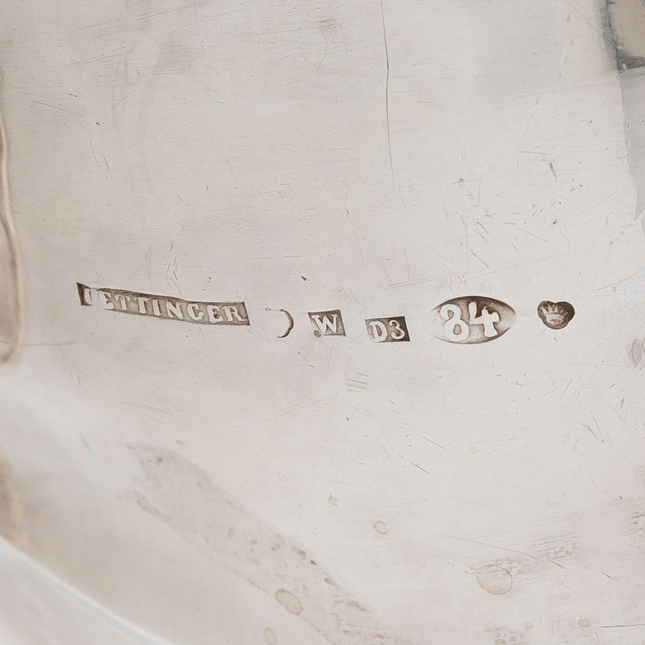 A parcel-gilt coffee pot, maker's mark of Johan Gustaf Ettinger, Vyborg 1861.