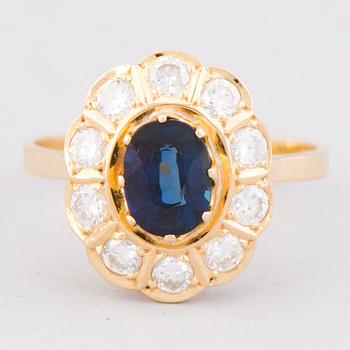 RING, fasettslipad safir, briljantslipade diamanter, 18K guld. Meidän Sepät, Esbo 1991.