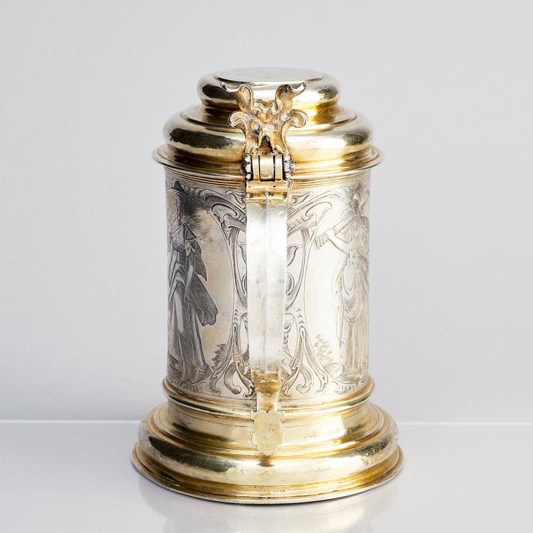 A German parcel-gilt silver tankard, mark of Walter Kopman, Hamburg (1649-1688).