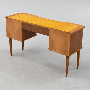 A Swedish Modern table, mid 20th Century.