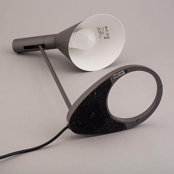 An Arne Jacobsen "AJ" table lamp.