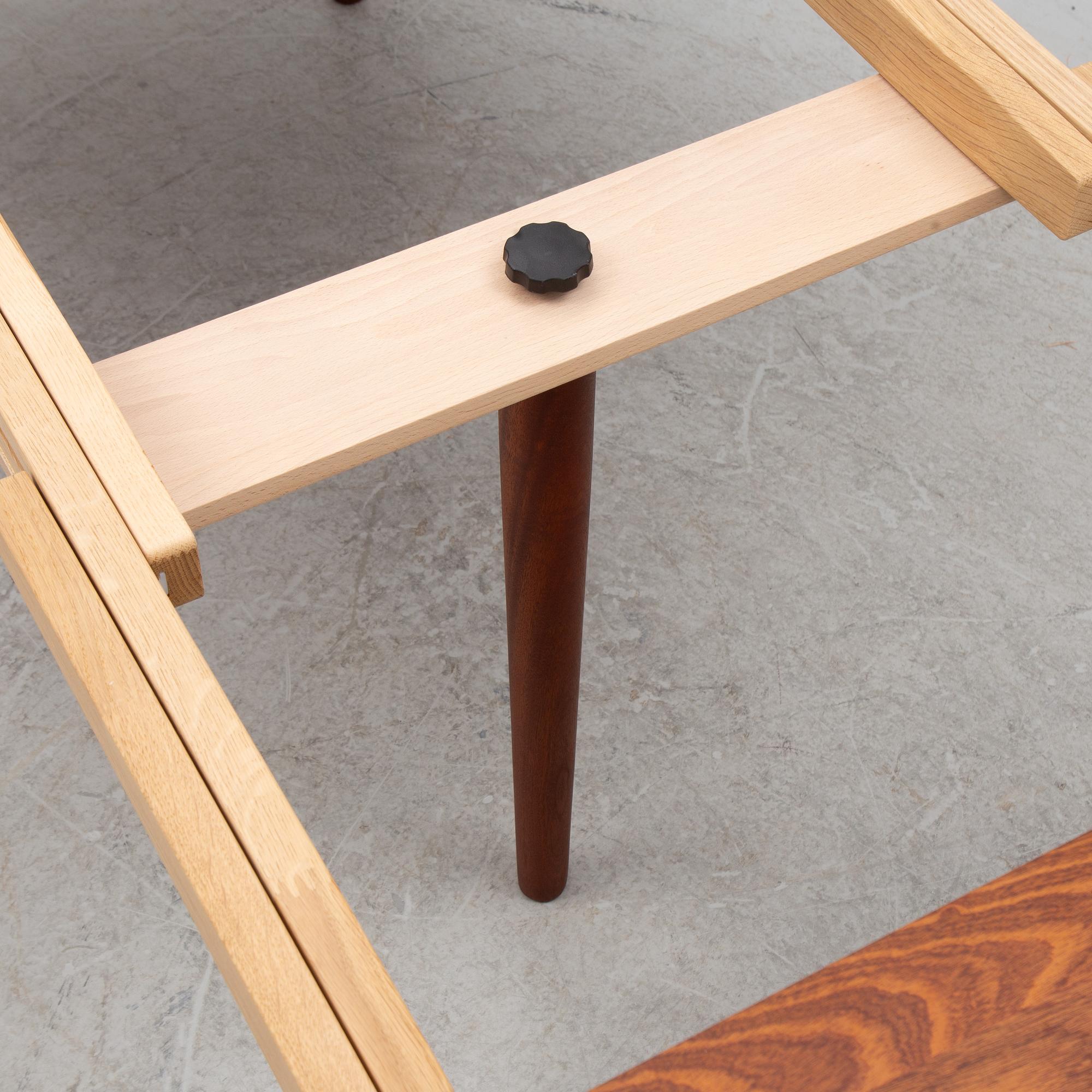 A contemporary 'Classic 255-265 Extension Table', Denmark.