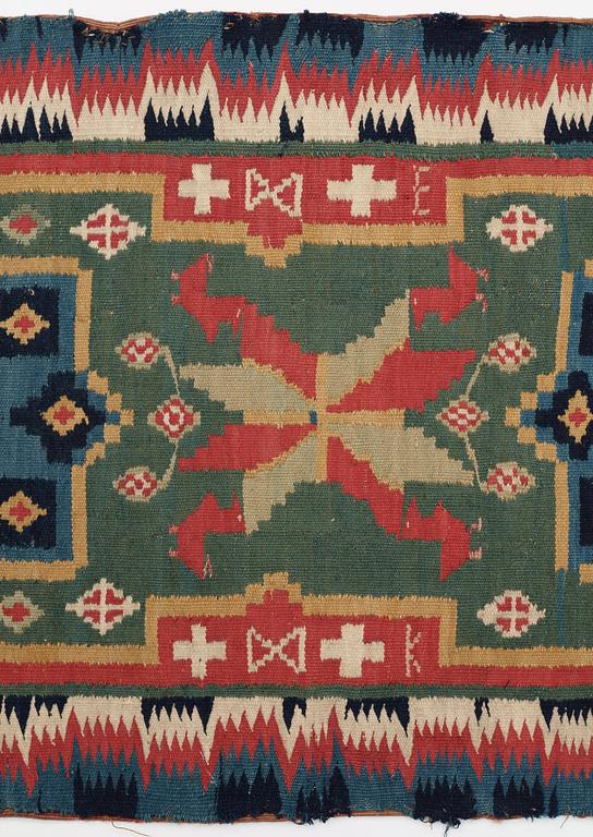 CARRIAGE CUSHION. Rölakan (flat weave). 45,5 x 96,5 cm. Skåne first half of the 19th century.