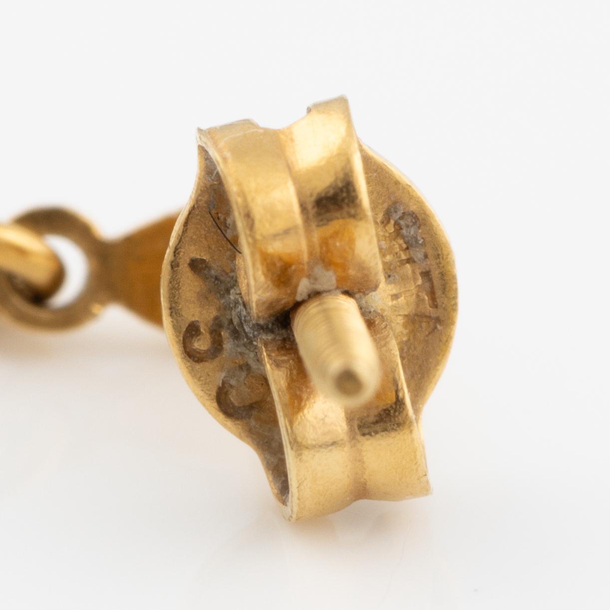 Earrings, 18K gold in the form of a pierrot.