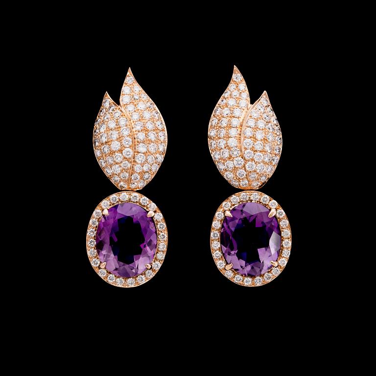 A pair of amethyst and brilliant cut diamond earrings, tot. 1.84 cts.