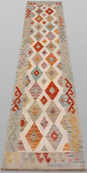 A Kilim runner, approx. 291 x 71 cm.